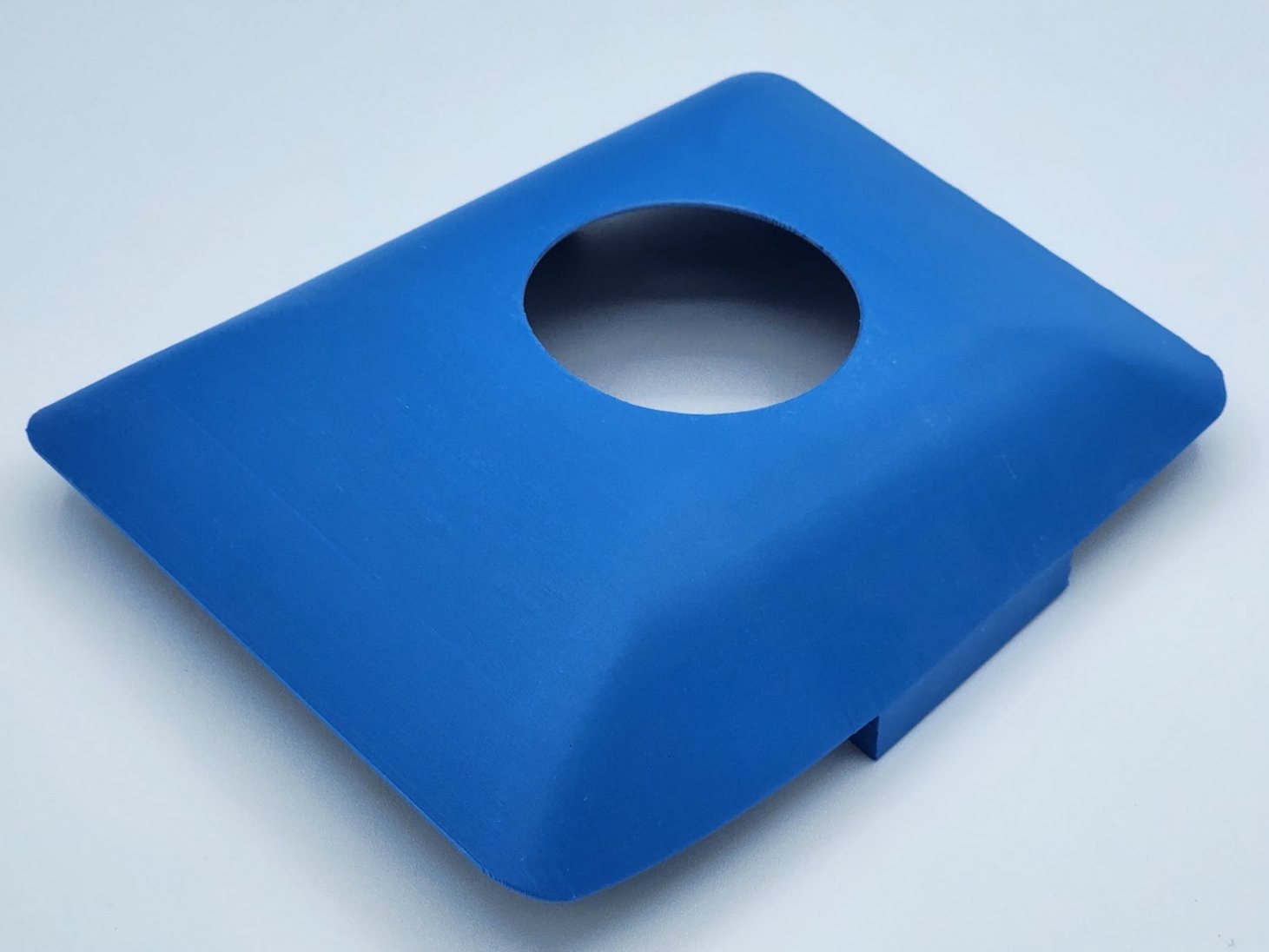 The side profile of a blue ball mouse cover