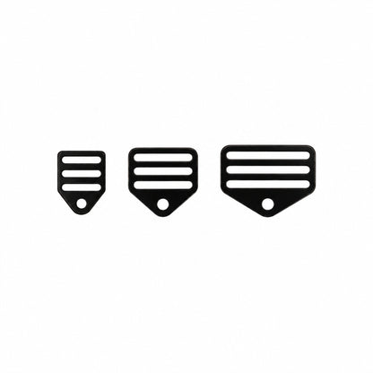 Three black webbing harness mounts on a white background